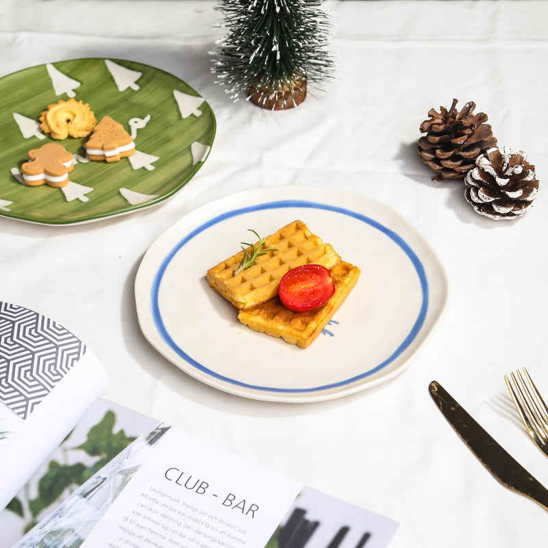 Juego de platos navideños