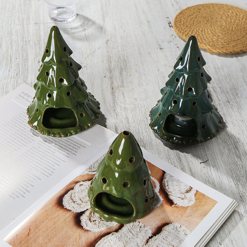 Tarro de vela con diseño de árbol de Navidad.